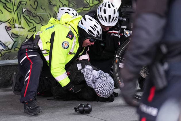 11 arrested at anti-immigration rally and counter-demonstration in Toronto TORONTO, CANADA - JANUARY 10 : Police detain a protestor as anti-immigration protestors and counter-demonstrators march in downtown Toronto, Ontario on January 10, 2026. Canada First protestors and counter demonstrators gathered at Nathan Phillips Square and marched in downtown Toronto. Clashes broke out between police and protesters, eleven protesters arrested. Mert Alper Dervis Anadolu Ontario Canada. Editorial use only. Please get in touch for any other usage.  Copyright: x2026xAnadoluxMertxAlperxDervisx