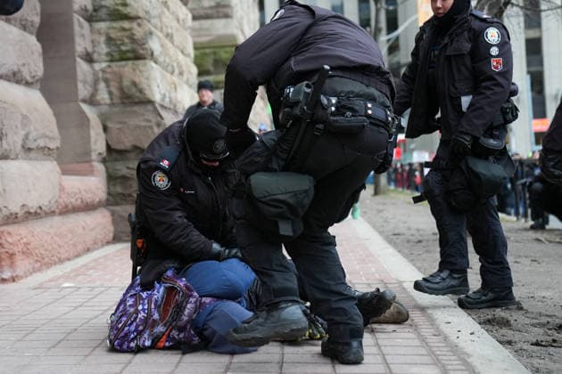 11 arrested at anti-immigration rally and counter-demonstration in Toronto TORONTO, CANADA - JANUARY 10 : Police detain a protestor as anti-immigration protestors and counter-demonstrators march in downtown Toronto, Ontario on January 10, 2026. Canada First protestors and counter demonstrators gathered at Nathan Phillips Square and marched in downtown Toronto. Clashes broke out between police and protesters, eleven protesters arrested. Mert Alper Dervis Anadolu Ontario Canada. Editorial use only. Please get in touch for any other usage.  Copyright: x2026xAnadoluxMertxAlperxDervisx