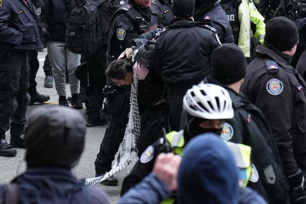 11 arrested at anti-immigration rally and counter-demonstration in Toronto TORONTO, CANADA - JANUARY 10 : Police detain protestors as opposition group and anti-immigration protestors march in downtown Toronto, Ontario on January 10, 2026. Canada First protestors and counter demonstrators gathered at Nathan Phillips Square and marched in downtown Toronto. Clashes broke out between police and protesters, eleven protesters arrested. Mert Alper Dervis Anadolu Ontario Canada. Editorial use only. Please get in touch for any other usage.  Copyright: x2026xAnadoluxMertxAlperxDervisx