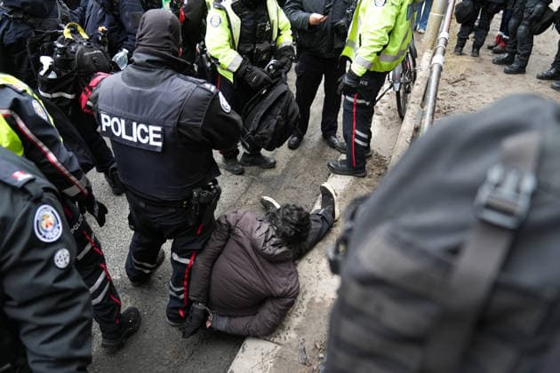 11 arrested at anti-immigration rally and counter-demonstration in Toronto TORONTO, CANADA - JANUARY 10 : Police detain a protestor as anti-immigration protestors and counter-demonstrators march in downtown Toronto, Ontario on January 10, 2026. Canada First protestors and counter demonstrators gathered at Nathan Phillips Square and marched in downtown Toronto. Clashes broke out between police and protesters, eleven protesters arrested. Mert Alper Dervis Anadolu Ontario Canada. Editorial use only. Please get in touch for any other usage.  Copyright: x2026xAnadoluxMertxAlperxDervisx