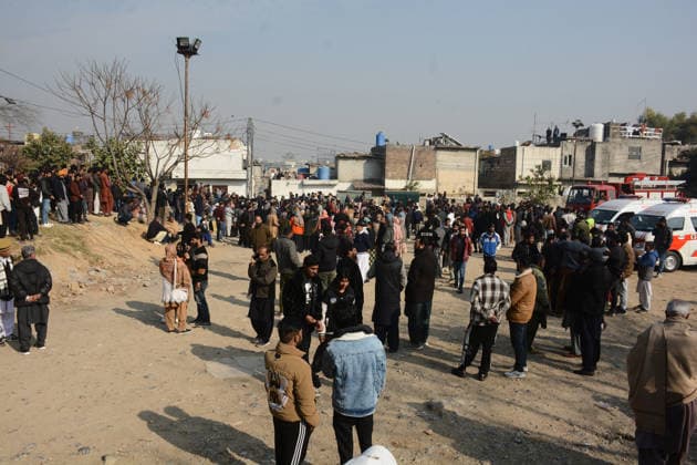 Gas cylinder explosion at Islamabad wedding kills eight, including bride and groom ISLAMABAD, PAKISTAN, JANUARY 11: Local residents gather at the site of a powerful gas cylinder explosion at a wedding function in a neighborhood of Islamabad on January 11, 2026. The blast killed eight people, including the bride and groom and their grandparents, injured 12 others, and caused the collapse of adjoining houses. Muhammad Reza Anadolu Islamabad Pakistan. Editorial use only. Please get in touch for any other usage.  Copyright: x2026xAnadoluxMuhammadxRezax