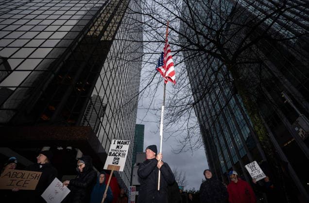 January 11, 2026, Vancouver, Bc, CANADA: People demonstrate during an Ice Out For Good rally outside of the U.S. Consulate General office in Vancouver, on Sunday, January 11, 2026. Vancouver CANADA  - ZUMAc35_ 20260111_zaf_c35_040 Copyright: xEthanxCairnsx