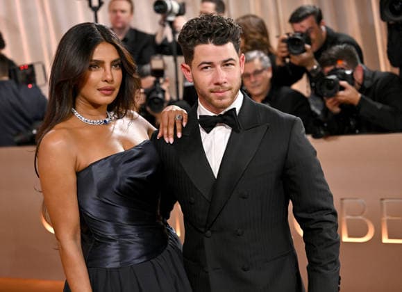 Priyanka Chopra Jonas and Nick Jonas attend the 83rd annual Golden Globe Awards at the Beverly Hilton Hotel in Beverly Hills, California on Sunday, January 11, 2026.  LAP20260111317 CHRISxCHEW