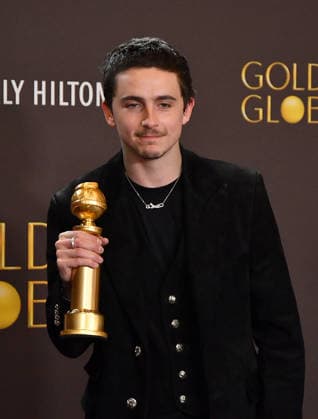 83rd Annual Golden Globe Awards - Press Room TimothÃ e Chalamet poses with the the Golden Globe award for best actor in a musical or comedy the 83rd annual Golden Globe Awards at The Beverly Hilton on January 11, 2026 in Beverly Hills, California. Beverly Hills Beverly Hilton California USA Copyright: ximageSPACEx