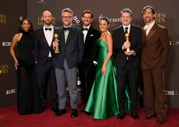 Frida Perez, Evan Goldberg, Seth Rogen, Peter Huyck, Chase Sui Wonders, Alex Gregory and James Weaver appear backstage after winning the award for Best Television Series - Musical or Comedy award for The Studio during the 83rd annual Golden Globe Awards at the Beverly Hilton in Beverly Hills, California on Sunday, January 11, 2026.  LAP20260111240 JIMxRUYMEN