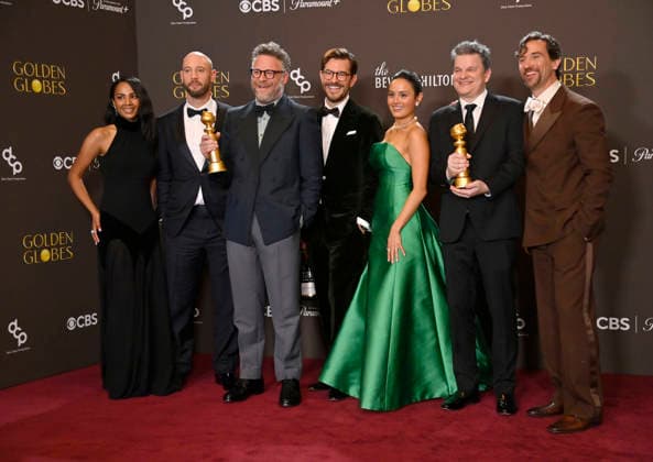 Frida Perez, Evan Goldberg, Seth Rogen, Peter Huyck, Chase Sui Wonders, Alex Gregory and James Weaver appear backstage after winning the award for Best Television Series - Musical or Comedy award for The Studio during the 83rd annual Golden Globe Awards at the Beverly Hilton in Beverly Hills, California on Sunday, January 11, 2026.  LAP20260111270 JIMxRUYMEN