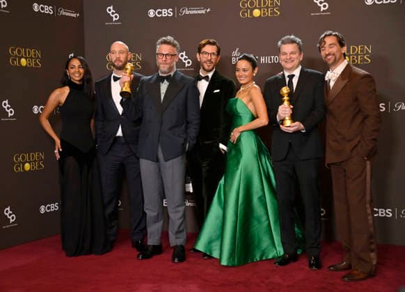 Frida Perez, Evan Goldberg, Seth Rogen, Peter Huyck, Chase Sui Wonders, Alex Gregory and James Weaver appear backstage after winning the award for Best Television Series - Musical or Comedy award for The Studio during the 83rd annual Golden Globe Awards at the Beverly Hilton in Beverly Hills, California on Sunday, January 11, 2026.  LAP20260111279 JIMxRUYMEN
