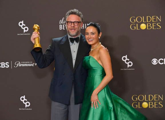 Seth Rogen and Chase Sui Wonders appear backstage after winning the award for Best Television Series - Musical or Comedy award for The Studio during the 83rd annual Golden Globe Awards at the Beverly Hilton in Beverly Hills, California on Sunday, January 11, 2026.  LAP20260111290 JIMxRUYMEN