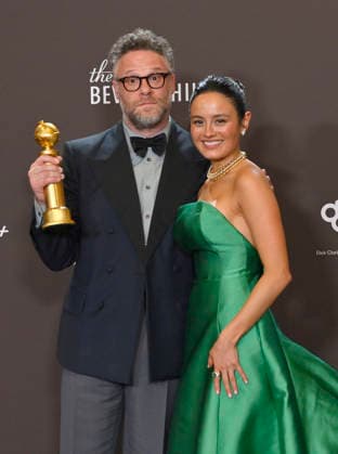 Seth Rogen and Chase Sui Wonders appear backstage after winning the award for Best Television Series - Musical or Comedy award for The Studio during the 83rd annual Golden Globe Awards at the Beverly Hilton in Beverly Hills, California on Sunday, January 11, 2026.  LAP20260111291 JIMxRUYMEN