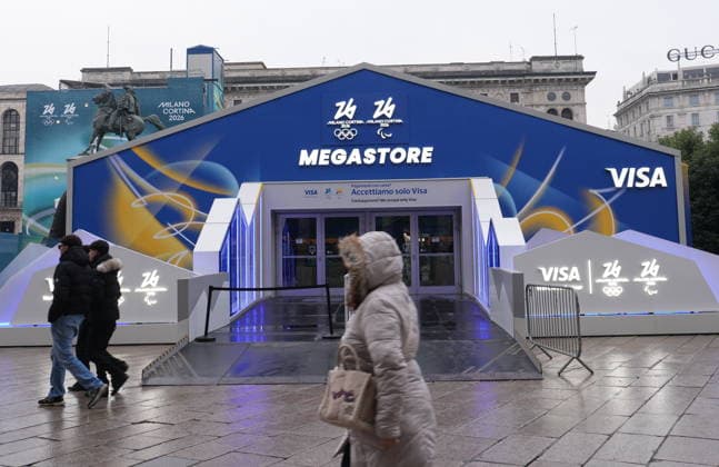 Milan, Megastore in Piazza Duomo for the Milan Cortina 2026 Winter Olympics and Paralympics, with the sale of gadgets and clothing and advertising - Milan Cortina 2026 Winter Olympic Games  Copyright: xDuilioxPiaggesix xipa-agency.netx xDuilioxPiaggesix IPA_Agency_IPA70053778