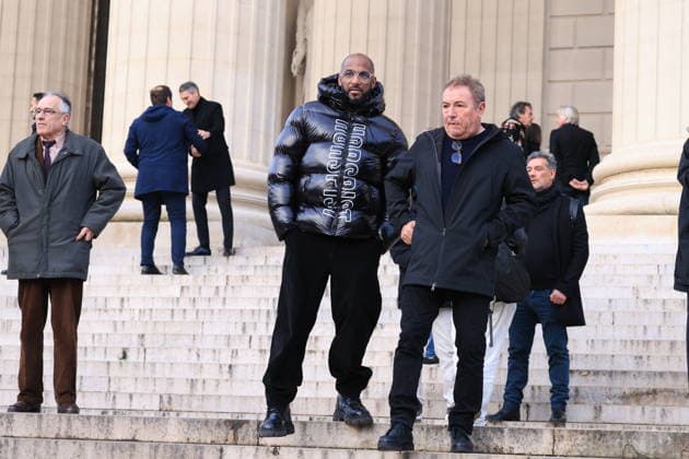 Figure of French Football Rolland Courbis Funeral - Paris Stomy Bugsy and Fabien Onteniente leaving the funeral ceremony for Rolland Courbis at Madeleine church in Paris, France on January 14, 2026. Rolland Courbis, a former French footballer, coach and outspoken media commentator has died aged 72. Photo by Jerome Domine ABACAPRESS.COM Paris France  Copyright: xDominexJerome ABACAx