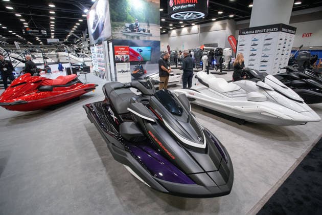 (260115) -- VANCOUVER, Jan. 15, 2026 -- People view personal watercraft during the Vancouver International Boat Show 2026 at the Vancouver Convention Centre in Vancouver, British Columbia, Canada, Jan. 14, 2026. The five-day show kicked off here on Wednesday, with hundreds of exhibitors from around the world showcasing the latest vessels, marine gears and marine technology. (Photo by Xinhua) CANADA-VANCOUVER-INT L BOAT SHOW 2026 LiangxSen 