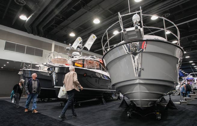(260115) -- VANCOUVER, Jan. 15, 2026 -- People attend the Vancouver International Boat Show 2026 at the Vancouver Convention Centre in Vancouver, British Columbia, Canada, Jan. 14, 2026. The five-day show kicked off here on Wednesday, with hundreds of exhibitors from around the world showcasing the latest vessels, marine gears and marine technology. (Photo by Xinhua) CANADA-VANCOUVER-INT L BOAT SHOW 2026 LiangxSen 