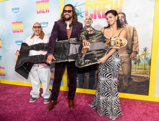 January 15, 2026, Bronx, New York, USA: Jacob Batalon, Jason Momoa holding cutout of Dave Bautista, who did not attend, and Morena Baccarin attend special screening of The Wrecking Crew at Regal Times Square in New York, NY on January 15, 2026 Bronx USA - ZUMAr339 20260115_znp_r339_050 Copyright: xLevxRadinx