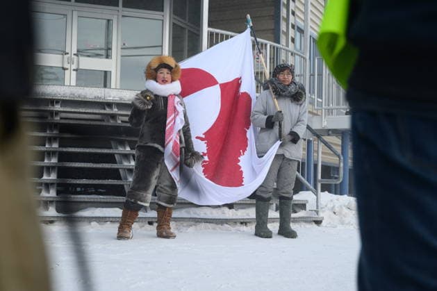 January 17, 2026, Iqaluit, Nu, Canada: Iqaluit residents, Laakkuluk Williamson Bathory and Siku Rojas hold a Greenlandic banner during a solidarity march through NunavutöÄÃ s capital on Saturday, Jan. 17, 2026. Iqaluit Canada  - ZUMAc35_ 20260117_zaf_c35_027 Copyright: xDustinxPatarx