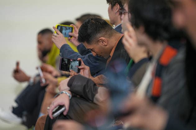 Milan, Milan Men s Fashion Week: Fall Winter 2026 - Men s Fashion, Fall Winter 2026 - Paul Smith Fashion Show - Catwalk In the photo: smartphone detail  Copyright: xRiccardoxGIordanox xipa-agency.netx xRiccardoxGiordanox IPA_Agency_IPA70213185