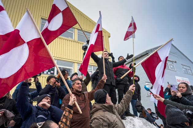 (260118) -- NUUK, Jan. 18, 2026 -- Greenland s Prime Minister Jens-Frederik Nielsen (L, on the snow) is seen during a demonstration against U.S. actions and remarks suggesting control over Greenland in Nuuk, capital of Greenland, an autonomous territory of Denmark, Jan. 17, 2026. TO GO WITH Feature: Hands off Greenland : protesters push back at U.S. takeover bid. (Photo by Xinhua) (SpotNews)DENMARK-GREENLAND-NUUK-DEMONSTRATION AndersxKongshaug 