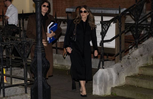 January 19, 2026, London, England, United Kingdom: ELIZABETH HURLEY and her son DAMIAN HURLEY leave the Royal Courts Of Justice, central London, after the first day of the trial over allegations of unlawful information gathering brought against Associated Newspapers Limited (ANL) by seven people - the Duke of Sussex, Baroness Doreen Lawrence, Sir Elton John, David Furnish, Liz Hurley, Sadie Frost and Sir Simon Hughes. London United Kingdom - ZUMAs262 20260119_zip_s262_040 Copyright: xTayfunxSalcix