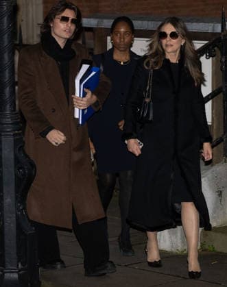 January 19, 2026, London, England, United Kingdom: ELIZABETH HURLEY and her son DAMIAN HURLEY leave the Royal Courts Of Justice, central London, after the first day of the trial over allegations of unlawful information gathering brought against Associated Newspapers Limited (ANL) by seven people - the Duke of Sussex, Baroness Doreen Lawrence, Sir Elton John, David Furnish, Liz Hurley, Sadie Frost and Sir Simon Hughes. London United Kingdom - ZUMAs262 20260119_zip_s262_043 Copyright: xTayfunxSalcix