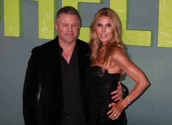 Shelter film premiere London, UK. Ric Roman Waugh and Tanya Waugh at the Shelter film premiere. Leicester Square. 20th January 2026. LMK11-S200126 001. Steve Bealing Landmark Media 