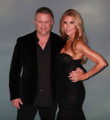 Shelter film premiere London, UK. Ric Roman Waugh and Tanya Waugh at the Shelter film premiere. Leicester Square. 20th January 2026. LMK11-S200126 001. Steve Bealing Landmark Media 