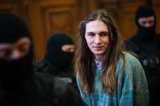January 22, 2026, Budapest, Budapest, Hungary: MAJA T., a German anti-fascist activist being escorted into the Budapest-Capital Regional Court during a trial hearing under heavy guard. The antifa activist has been in custody in Hungary for many months now, where years of prison could await them if found guilty in a violent attack of far-right supporters after their rally back in 2023, in Budapest. Budapest Hungary - ZUMAa256 20260122_zip_a256_008 Copyright: xDanielxAlfoldix