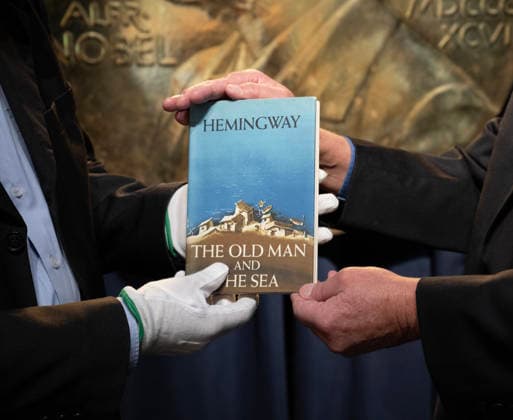 Stockholm 20260123 American Hemingway connoisseur Curtis DeBerg hands over the Hemingway book The Old Man and the Sea to Nobel Prize Museum curator Ulf Larsson The book h  Copyright: xFredrikxSandberg TTx HEMINGWAYBOK wsvU46fv1X4