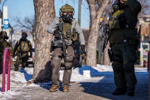 January 24, 2026, Minneapolis, Minnesota, USA: ICE, Border Patrol, State Patrol and Minneapolis PD agents clash with protestors in a volatile situation that developed after another fatal shooting by a federal agent in Minneapolis Saturday morning. Minneapolis USA - ZUMAs326 20260124_znp_s326_029 Copyright: xHoldenxSmithx