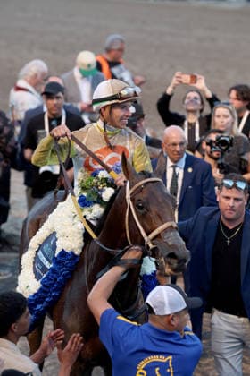 HALLANDALE BEACH, FL - JANUARY 24: Skippylongstocking (5) with jockey Tyler Gaffalione takes the lead against White Albarrio (11) with jockey Irad Ortiz, Jr. during the Pegasus World Cup Invitational horse race on January 24, 2026, at Gulfstream Park in Hallandale Beach, Florida People: Skippylongstocking, Tyler Gaffalione . Copyright: xhoo-me.com MediaPunchx