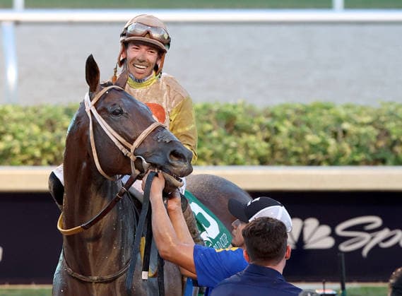 HALLANDALE BEACH, FL - JANUARY 24: Skippylongstocking (5) with jockey Tyler Gaffalione takes the lead against White Albarrio (11) with jockey Irad Ortiz, Jr. during the Pegasus World Cup Invitational horse race on January 24, 2026, at Gulfstream Park in Hallandale Beach, Florida People: Skippylongstocking, Tyler Gaffalione . Copyright: xhoo-me.com MediaPunchx
