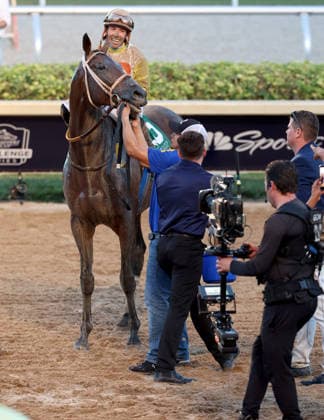HALLANDALE BEACH, FL - JANUARY 24: Skippylongstocking (5) with jockey Tyler Gaffalione takes the lead against White Albarrio (11) with jockey Irad Ortiz, Jr. during the Pegasus World Cup Invitational horse race on January 24, 2026, at Gulfstream Park in Hallandale Beach, Florida People: Skippylongstocking, Tyler Gaffalione . Copyright: xhoo-me.com MediaPunchx