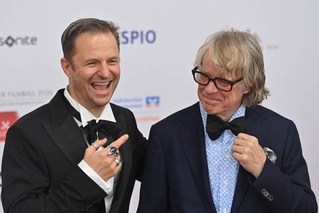 from left Philipp HOCHMAYR actor , Helge SCHNEIDER comedian,musician , 50 German Film Ball, Red Carpet, Red Carpet, on 24 01 2026 at the H o t e l B a y e r i s h o f, M u e n c h e n