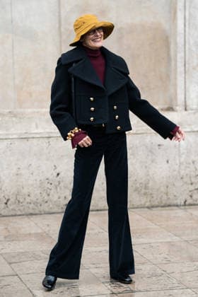Patou - Outside Arrivals - Paris Fashion Week - Menswear Fall Winter 2026-2027 Ines de la Fressange wears red turtleneck sweater, black pants, black cropped coat, yellow bucket hat, outside Patou Menswear Fall Winter 2026-2027 show as part of Paris Fashion Week on January 25, 2026 in Paris, France., Credit:Lounis Tiar Avalon France, Paris  Copyright: xLounisxTiarx xAvalonx 1069343659