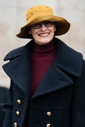 Patou - Outside Arrivals - Paris Fashion Week - Menswear Fall Winter 2026-2027 Ines de la Fressange wears red turtleneck sweater, black pants, black cropped coat, yellow bucket hat, outside Patou Menswear Fall Winter 2026-2027 show as part of Paris Fashion Week on January 25, 2026 in Paris, France., Credit:Lounis Tiar Avalon France, Paris  Copyright: xLounisxTiarx xAvalonx 1069346872