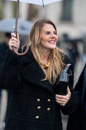 PFW - Patou Arrivals Anna Dello Russo wears black Patou fur short coat, red over the knees leather boots, black bag, gold chain necklace outside Patou Menswear Fall Winter 2026-2027 show as part of Paris Fashion Week on January 25, 2026 in Paris, France. Photo by LounisPhotography ABACAPRESS.COM Paris France  Copyright: xLounisPhotography ABACAx