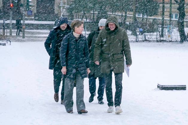 Gerhard Delling TV presenter with lawyer David Rieks Christina Block on foot in the snow on the way to the hearing in the trial for alleged child abduction in the Hamburg District Court Criminal Justice Building Abduction case of the Block children Hamburg Germany