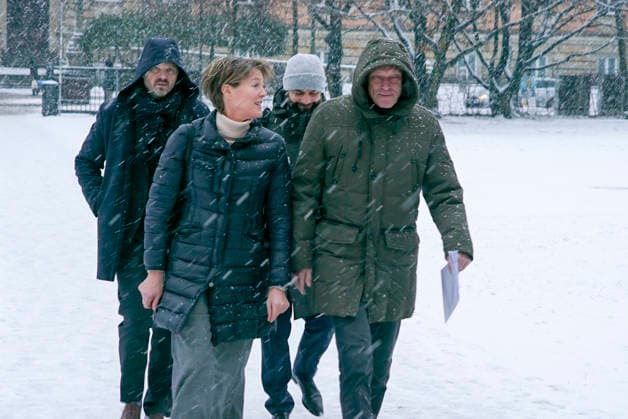 Gerhard Delling TV presenter with lawyer David Rieks Christina Block on foot in the snow on the way to the hearing in the trial for alleged child abduction in the Hamburg District Court Criminal Justice Building Abduction case of the Block children Hamburg Germany