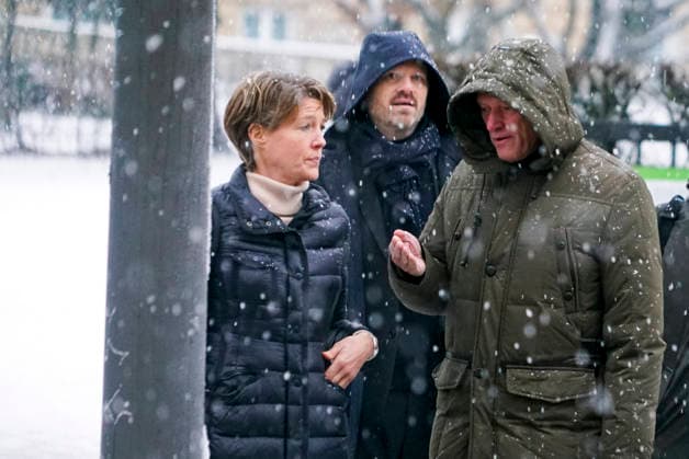 Gerhard Delling TV presenter with lawyer David Rieks Christina Block on foot in the snow on the way to the hearing in the trial for alleged child abduction in the Hamburg District Court Criminal Justice Building Abduction case of the Block children Hamburg Germany