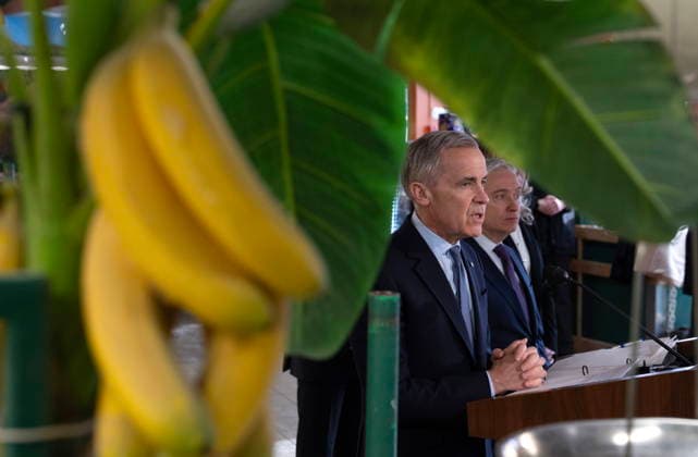 January 26, 2026, Ottawa, On, Canada: Finance and National Revenue Minister Francois-Philippe Champagne looks on as Prime Minister Mark Carney responds to questions from media during an event at a grocery store in Ottawa on Monday, Jan. 26, 2026. Ottawa Canada  - ZUMAc35_ 20260126_zaf_c35_006 Copyright: xAdrianxWyldx