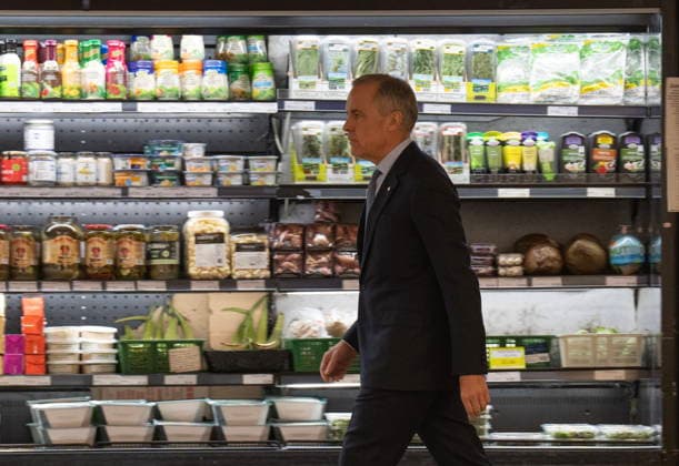 January 26, 2026, Ottawa, On, Canada: Prime Minister Mark Carney makes his way though a aisles to an event at a grocery store in Ottawa on Monday, Jan. 26, 2026. Ottawa Canada  - ZUMAc35_ 20260126_zaf_c35_056 Copyright: xAdrianxWyldx