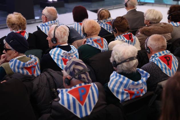 Holocaust remembrance ceremony at Auschwitz-Birkenau OSWIECIM, POLAND - JANUARY 27: Survivors of the Auschwitz-Birkenau Nazi German concentration and extermination camp, wearing symbolic striped scarves marked with the letter P for Polish political prisoners and their former prisoner numbers, attend an official ceremony marking the 81st anniversary of the camp s liberation and International Holocaust Remembrance Day in Oswiecim, Poland, on January 27, 2026. Jakub Porzycki Anadolu Oswiecim Poland. Editorial use only. Please get in touch for any other usage.  Copyright: x2026xAnadoluxJakubxPorzyckix