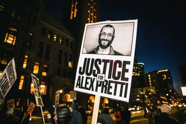 January 27, 2026, Minneapolis, Minnesota, USA: Activists from the social justice organization called PSL - PARTY FOR SOCIALISM AND LIBERATION hold a rally dubbed Ã¢â‚¬ËœBye Bye BovinoÃ¢â‚¬â ¢ to celebrate the reassignemnt of Border Commander GREGORY BOVINO who led the ICE - IMMIGRATION AND CUSTOMS ENFORCEMENT operation known as OPERATION METRO SURGE immigration crackdown in St. Paul, Minnesota. They also held signs in support of RENEE NICOLE GOOD and ALEX PRETTI both of whom were killed in recent weeks by federal agents. Minneapolis USA - ZUMAd256 20260127_znp_d256_045 Copyright: xDavexDeckerx