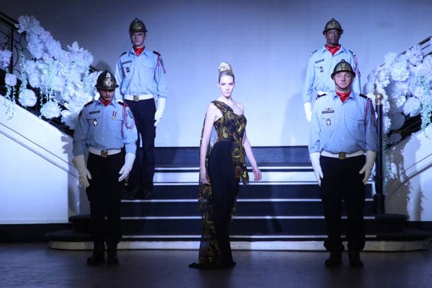 A Model and the Paris Firefighters who are present as Franck Sorbier donates a dress for a childrens auction at the Franck Sorbier, Haute Couture Spring Summer 2026 Collection runway show as part of Paris Fashion Week PFW at the Pavillon Wagram, in Paris, France, January 28, 2026 Bertrand Rindoff Bestimage Runway Franck Sorbier Haute Couture Spring Summer 2026 show as part of Paris Fashion Week on January 28, 2026 in Paris, France Paris France  Copyright: xBERTRANDxRINDOFFxPETROFFx xBESTIMAGExBERTRANDxRINDOFFxPETROFFx xBESTIMAGEx