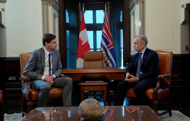 January 28, 2026, Ottawa, On, Canada: Prime Minister Mark Carney, right, sits with B.C. Premier David Eby at the start of a meeting in the prime minister s office in Ottawa, Wednesday, Jan. 28, 2026. Ottawa Canada  - ZUMAc35_ 20260128_zaf_c35_070 Copyright: xAdrianxWyldx