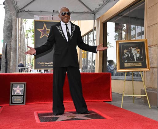 Singer-songwriter Ernie Isley of the US band The Isley Brothers stands on their star during an unveiling ceremony honoring them with the 2,834th star on the Hollywood Walk of Fame in Los Angeles on Wednesday, January 28, 2026.  LAP2026012808 JIMxRUYMEN