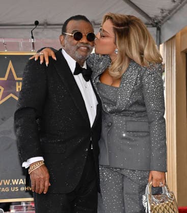 Singer-songwriter Ronald Isley of the US band The Isley Brothers is joined by his wife Kandy Johnson during an unveiling ceremony honoring the band with the 2,834th star on the Hollywood Walk of Fame in Los Angeles on Wednesday, January 28, 2026.  LAP2026012811 JIMxRUYMEN