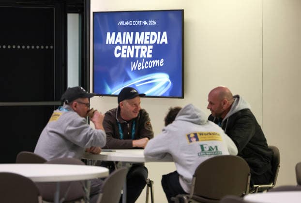 (260129) -- MILAN, Jan. 29, 2026 -- People communicate at the main media center (MMC) of the Milan-Cortina 2026 Olympic Winter Games in Milan, Italy, Jan. 28, 2026. ) (SP)ITALY-MILAN-WINTER OLYMPICS-MAIN MEDIA CENTER DuxXiaoyi 