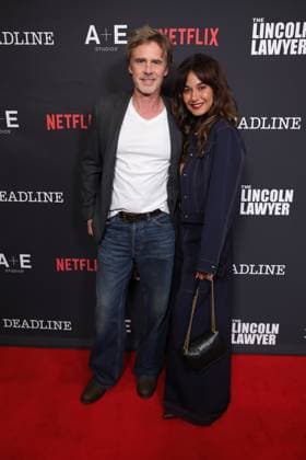 LOS ANGELES, CALIFORNIA - JANUARY 28: Sam Trammell and Emmanuelle Chriqui at the Season 4 Premiere of the Netflix™s hit series The Lincoln Lawyer on January 28, 2026 Copyright: xAdMediax MediaPunchx