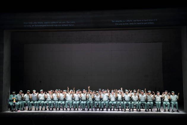 Marcell Bakonyi left as police chief and ensemble during the photo rehearsal for Lady Macbeth of Mtsensk at the Komische Oper im Schillertheater in Berlin, January 28, 2026 Opera in four acts by Dmitri Shostakovich Musical direction James Gaffigan Production Barrie Kosky Stage Rufus Didwiszus Costumes Victoria Behr Premiere is o