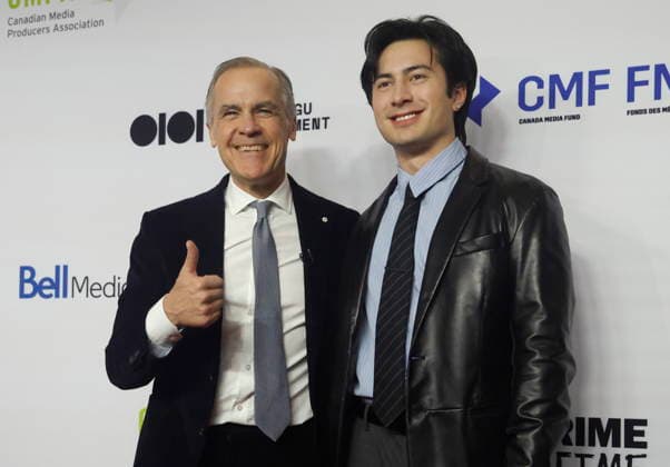 January 29, 2026, Ottawa, On, Canada: Prime Minister Mark Carney poses for a photo on the red carpet with Hudson Williams, star of the TV series Heated Rivalry at the Prime Time screen and media industry conference gala in Ottawa, on Thursday, January 29, 2026. Ottawa Canada  - ZUMAc35_ 20260129_zaf_c35_185 Copyright: xPatrickxDoylex